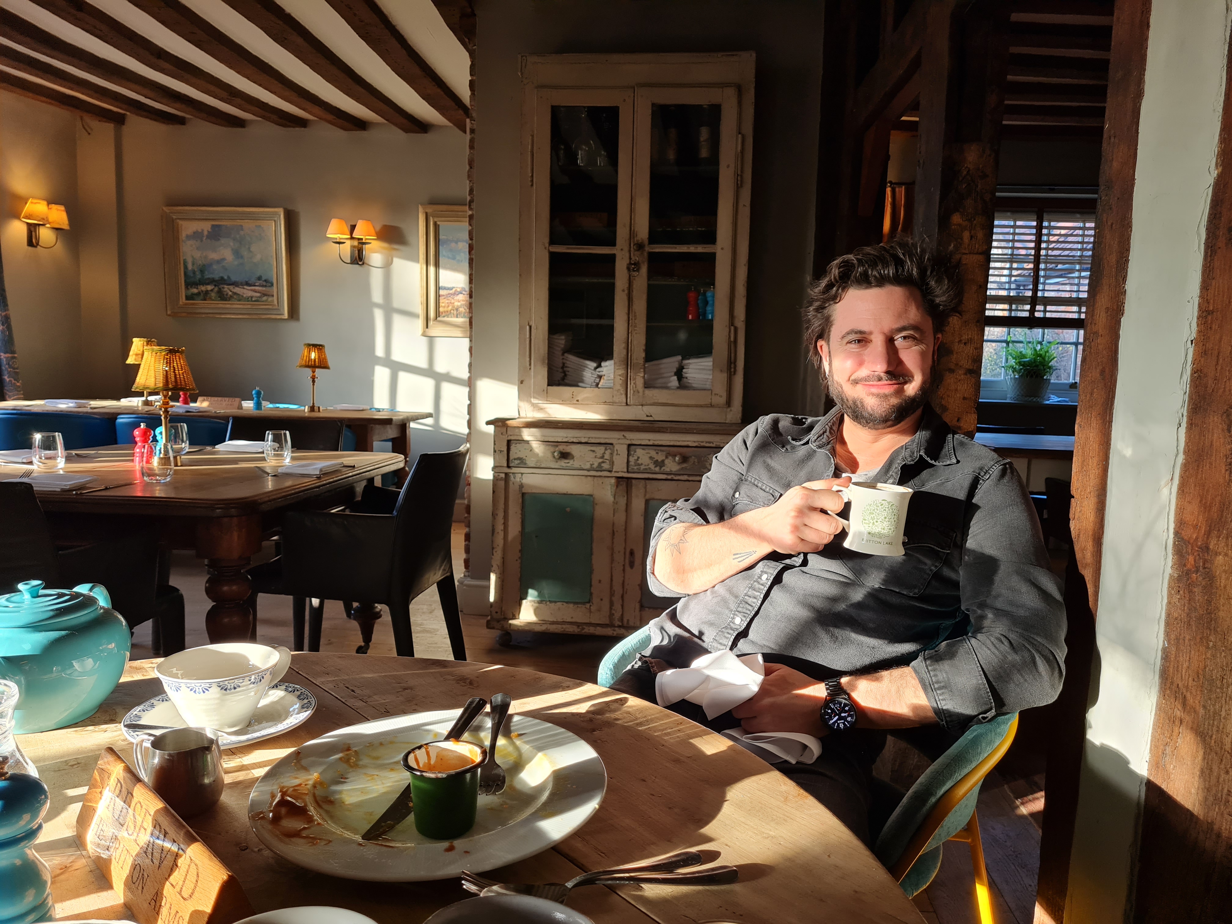 M﻿att having a morning coffee in the clubhouse