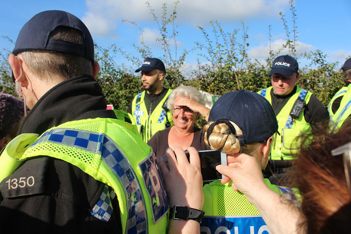 Brave police tackle fracking protest tea-lady head on